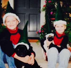 Elf hats on kids and dogs